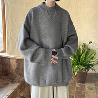 Gray loose round neck pullover sweater for men, suitable for spring and autumn wear.